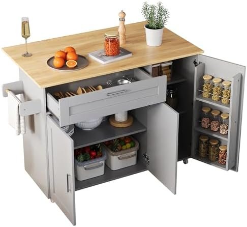 Mobiler Küchentisch mit ausgeklappter Arbeitsplatte und Eichenholz-Optik in einer modernen Küche.